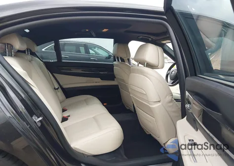 2014 BMW Alpina B7 из США, поврежденный, VIN WBAYE8C57ED134799